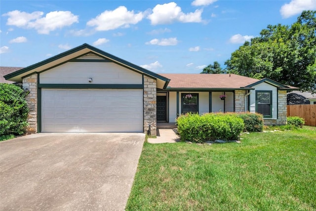 209 Lenz St, Round Rock, TX 78681 - single story home with stone siding, an attached garage, driveway, and roof with shingles