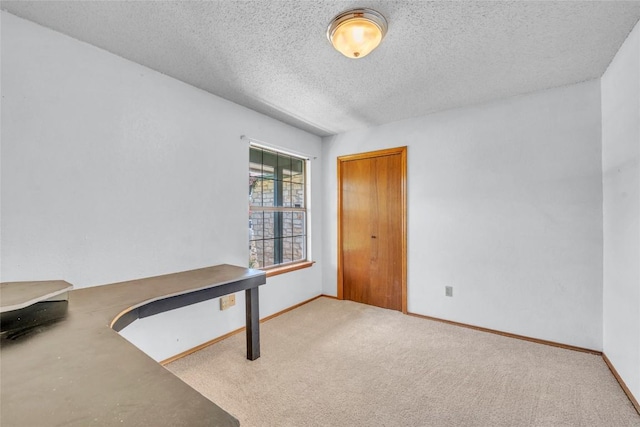 209 Lenz St, Round Rock, TX 78681 - unfurnished office featuring a textured ceiling and carpet