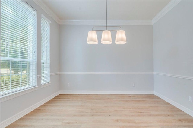 2804 Forest Green Dr, Round Rock, TX 78665 - spare room featuring light wood-style flooring and ornamental molding