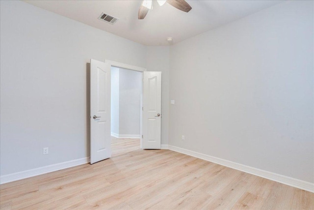 2804 Forest Green Dr, Round Rock, TX 78665 - spare room featuring light wood-style floors and ceiling fan