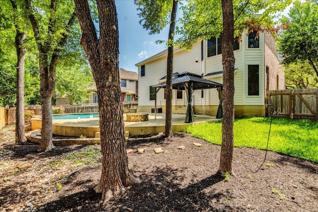 2804 Forest Green Dr, Round Rock, TX 78665 - back of house with a gazebo and a fenced backyard