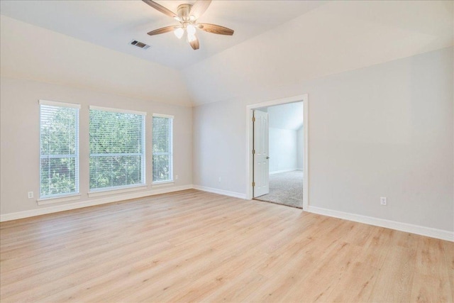 2804 Forest Green Dr, Round Rock, TX 78665 - empty room featuring light wood-style floors, ceiling fan, and lofted ceiling