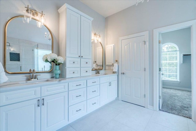 2804 Forest Green Dr, Round Rock, TX 78665 - full bathroom featuring double vanity, tile patterned flooring, and a tile shower