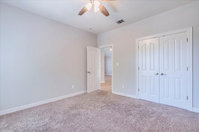 2804 Forest Green Dr, Round Rock, TX 78665 - unfurnished bedroom with light colored carpet, a closet, and ceiling fan