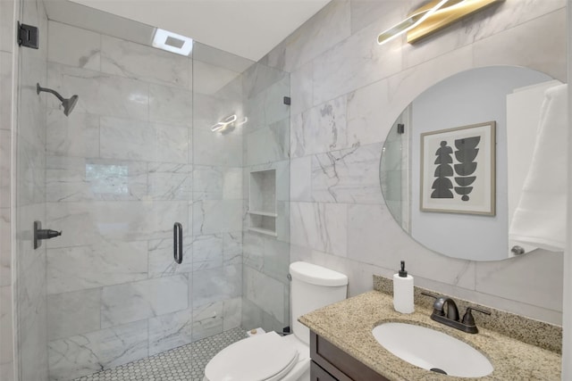 12307 Emery Oaks Rd, Austin, TX 78758 - full bath with tile walls, a stall shower, and vanity