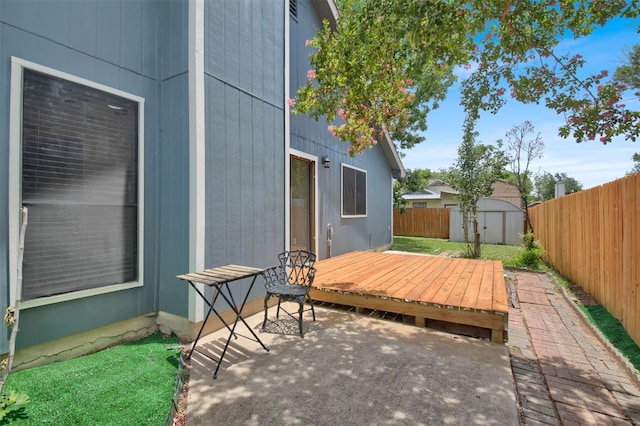 12307 Emery Oaks Rd, Austin, TX 78758 - fenced backyard featuring a storage unit, a deck, and a patio area