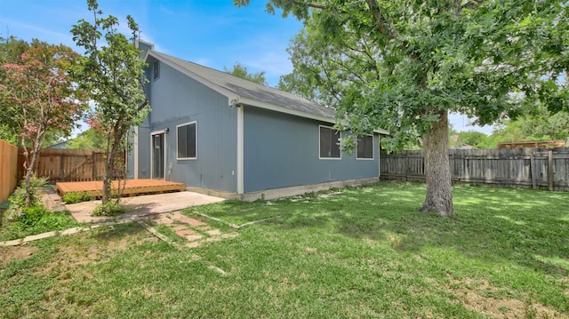 12307 Emery Oaks Rd, Austin, TX 78758 - view of side of property featuring a wooden deck and a fenced backyard