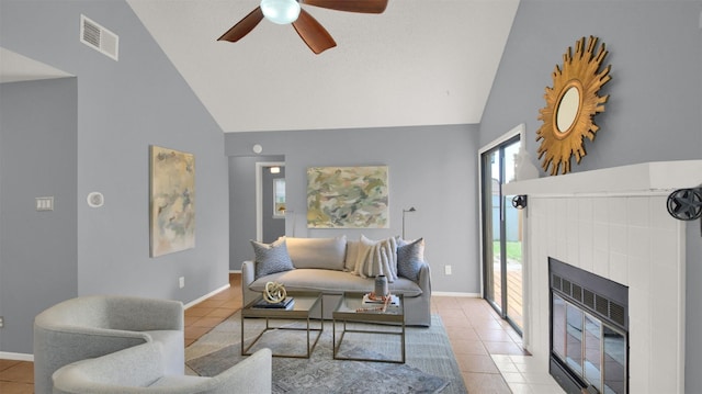 12307 Emery Oaks Rd, Austin, TX 78758 - tiled living area featuring high vaulted ceiling, a ceiling fan, and a fireplace