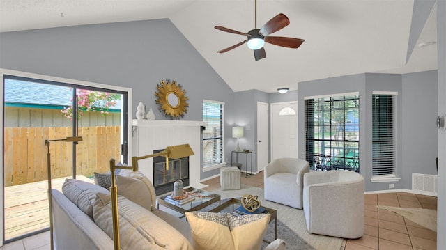 12307 Emery Oaks Rd, Austin, TX 78758 - tiled living area featuring high vaulted ceiling and a ceiling fan