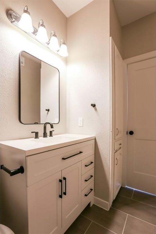 203 E 31st St Unit 206, Austin, TX 78705 - bathroom featuring vanity and tile patterned floors