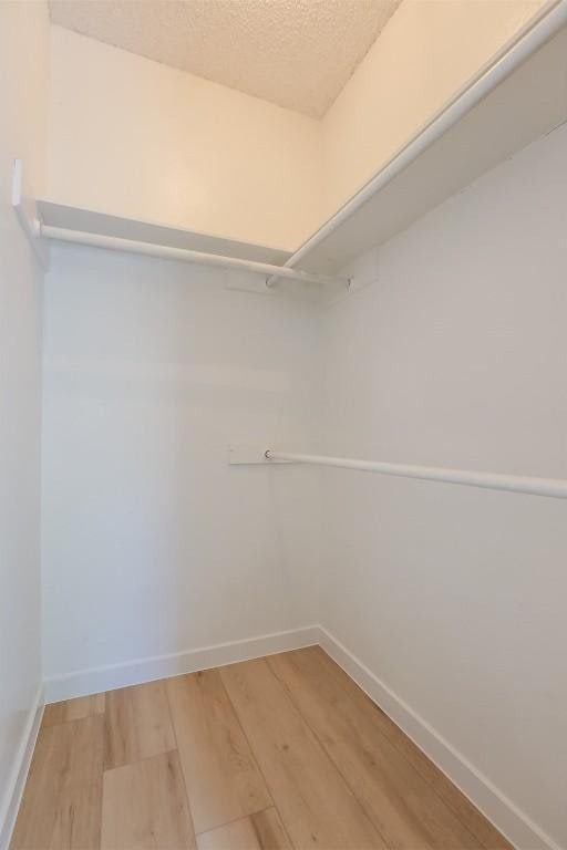 203 E 31st St Unit 206, Austin, TX 78705 - walk in closet with light wood finished floors
