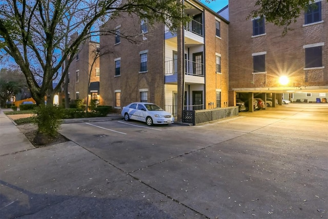 203 E 31st St Unit 206, Austin, TX 78705 - view of apartment building / complex featuring uncovered parking