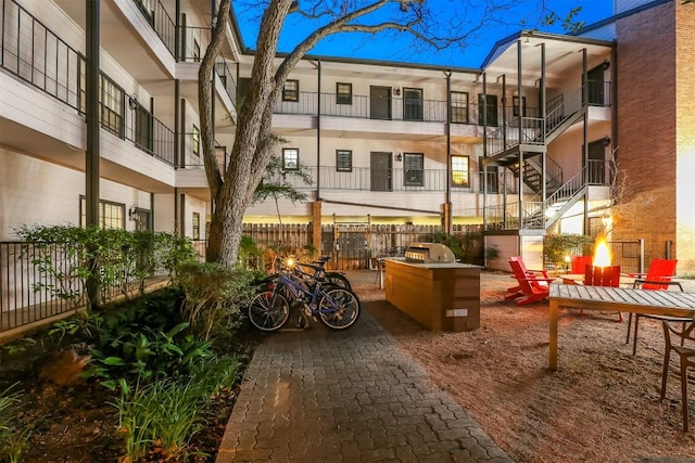 203 E 31st St Unit 206, Austin, TX 78705 - surrounding community featuring an outdoor fire pit and stairs