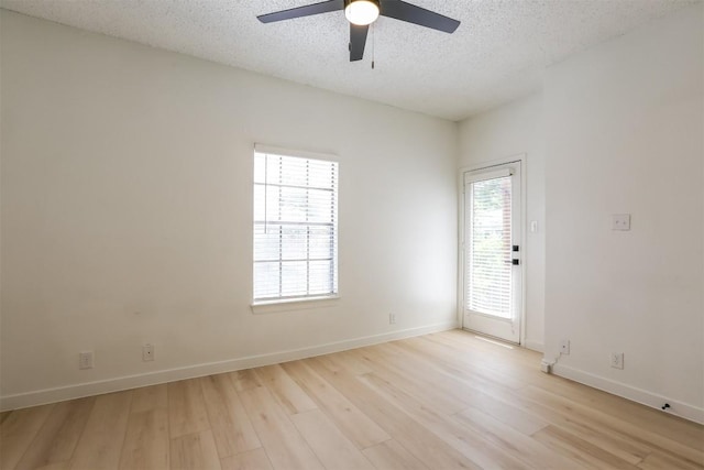 203 E 31st St Unit 206, Austin, TX 78705 - unfurnished room with a ceiling fan, light wood-style floors, and a textured ceiling