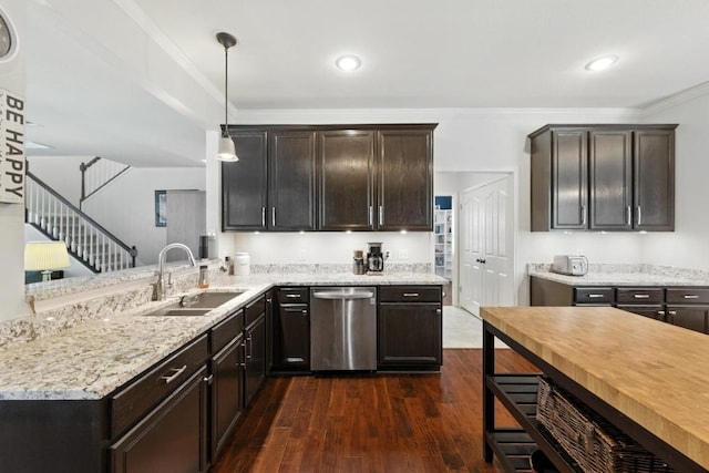 12532 Labrador Cv, Austin, TX 78729 - kitchen with dishwasher, dark wood-style flooring, light stone counters, ornamental molding, and dark brown cabinets