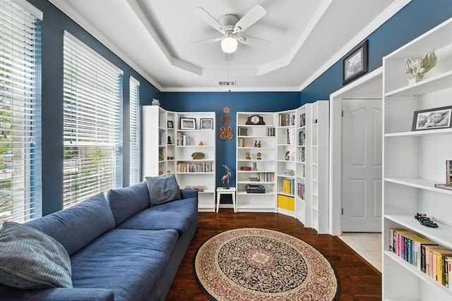 12532 Labrador Cv, Austin, TX 78729 - sitting room featuring a tray ceiling, wood finished floors, and ceiling fan