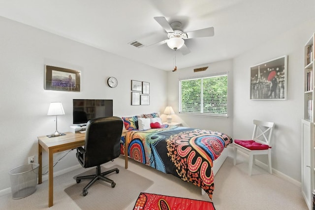 12532 Labrador Cv, Austin, TX 78729 - bedroom featuring carpet floors, an office area, and a ceiling fan