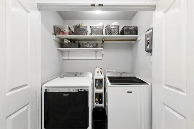 12532 Labrador Cv, Austin, TX 78729 - laundry room featuring washing machine and clothes dryer