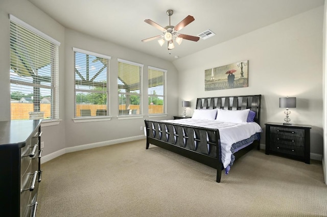21506 Greylag Dr, Pflugerville, TX 78660 - carpeted bedroom featuring multiple windows and a ceiling fan