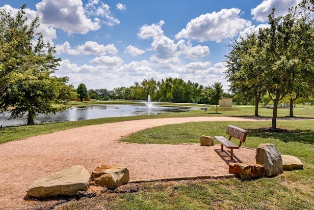 21506 Greylag Dr, Pflugerville, TX 78660 - view of home's community featuring a water view and a yard