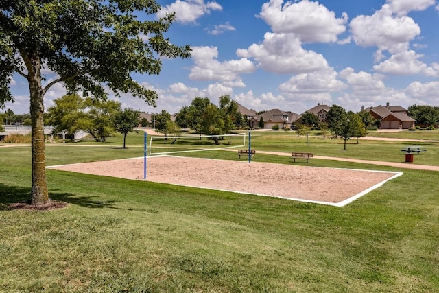 21506 Greylag Dr, Pflugerville, TX 78660 - view of property's community with volleyball court and a lawn