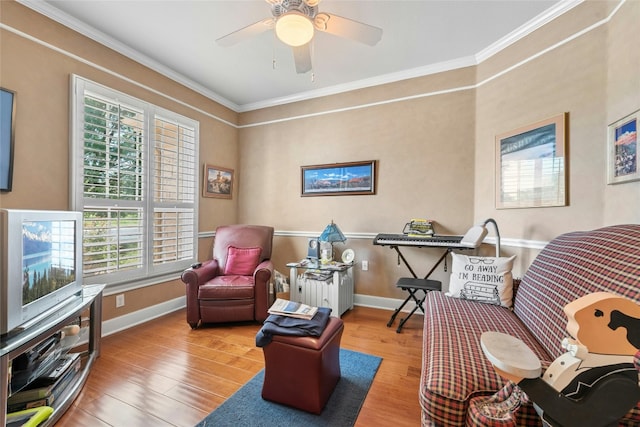207 Breezeway Ln, Georgetown, TX 78633 - living area with wood finished floors, ornamental molding, and a ceiling fan