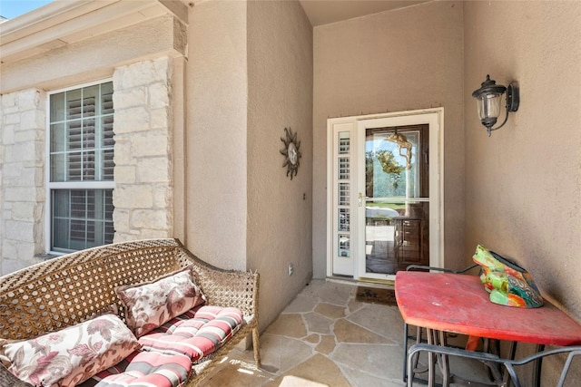 207 Breezeway Ln, Georgetown, TX 78633 - doorway to property with stucco siding and stone siding