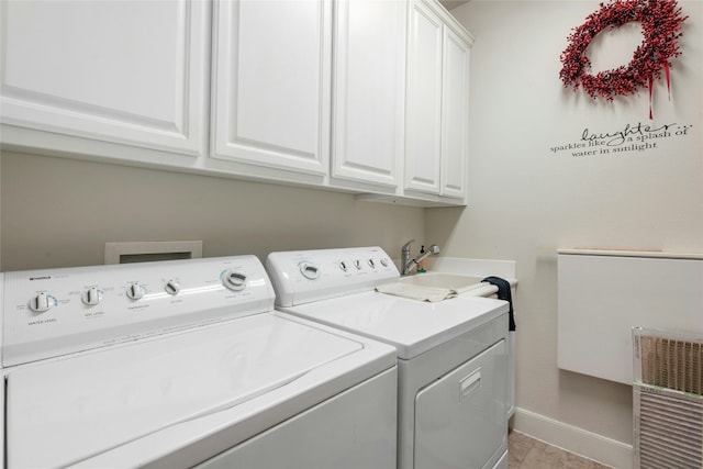207 Breezeway Ln, Georgetown, TX 78633 - laundry area featuring washer and clothes dryer and cabinet space