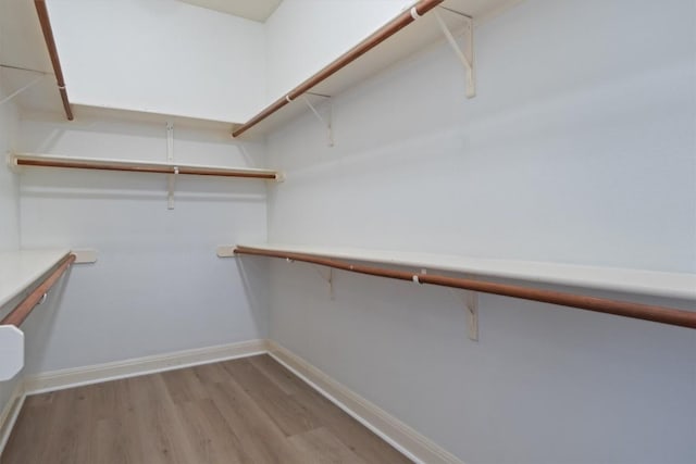 10303 Spicewood Pkwy, Austin, TX 78750 - spacious closet featuring light wood-type flooring