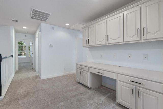 10303 Spicewood Pkwy, Austin, TX 78750 - unfurnished office featuring built in desk, light colored carpet, and recessed lighting
