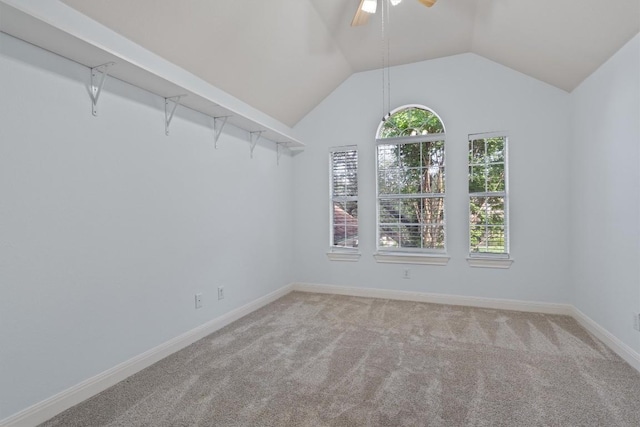 10303 Spicewood Pkwy, Austin, TX 78750 - empty room featuring carpet floors, ceiling fan, and vaulted ceiling