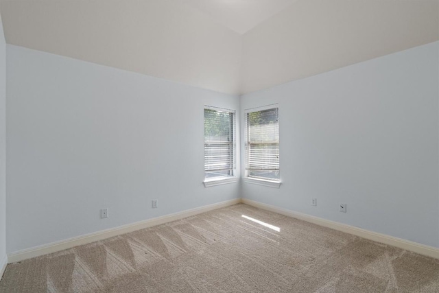 10303 Spicewood Pkwy, Austin, TX 78750 - empty room with light carpet and lofted ceiling