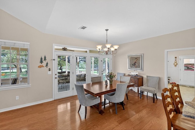 127 W Stonecastle Dr, Granite Shoals, TX 78654 - dining space with a chandelier, healthy amount of natural light, and light wood finished floors
