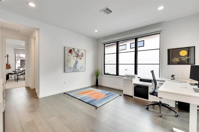 6702 Adeline Way Unit 34, Austin, TX 78746 - office with healthy amount of natural light, wood finished floors, and recessed lighting