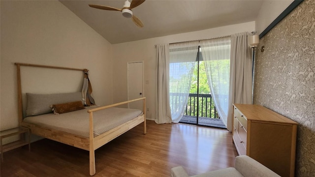 7122 Wood Hollow Dr Unit 41, Austin, TX 78731 - bedroom featuring access to exterior, wood finished floors, lofted ceiling, and ceiling fan