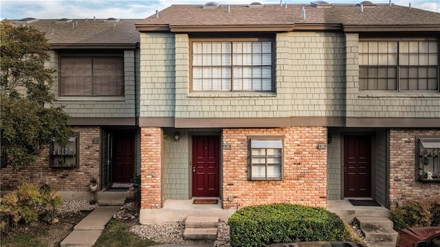 7122 Wood Hollow Dr Unit 41, Austin, TX 78731 - townhome / multi-family property with brick siding