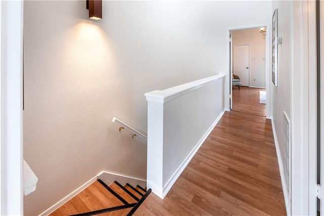 7122 Wood Hollow Dr Unit 41, Austin, TX 78731 - corridor with an upstairs landing and wood finished floors