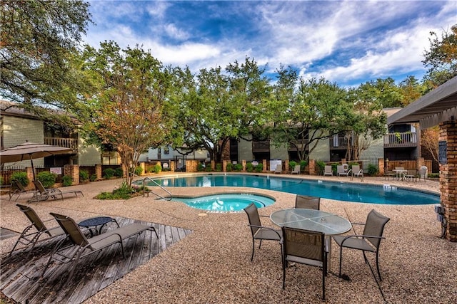 7122 Wood Hollow Dr Unit 41, Austin, TX 78731 - community pool featuring a community hot tub and a patio