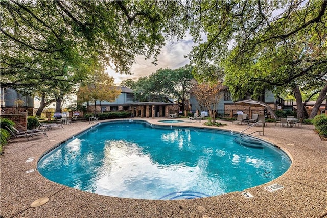 7122 Wood Hollow Dr Unit 41, Austin, TX 78731 - community pool with a community hot tub and a patio