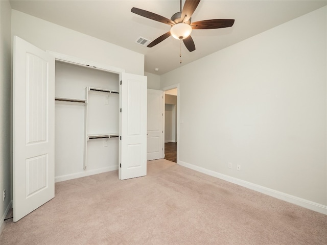 2320 Lucky Ln, Leander, TX 78641 - unfurnished bedroom with light colored carpet, a closet, and ceiling fan