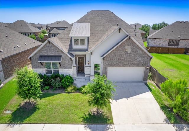 2320 Lucky Ln, Leander, TX 78641 - view of front of house featuring driveway, a shingled roof, a residential view, stone siding, and brick siding