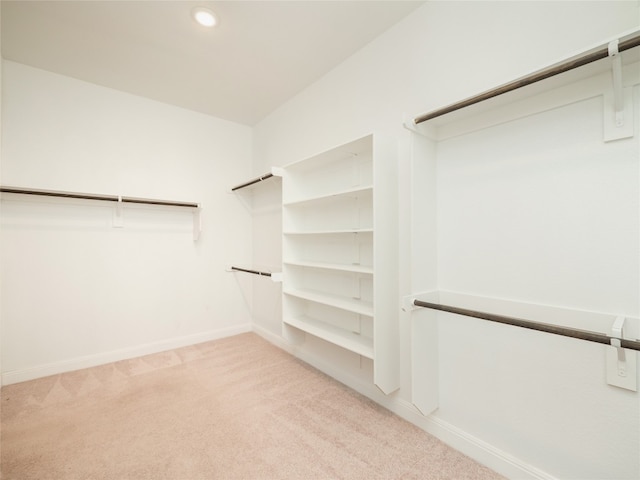 2320 Lucky Ln, Leander, TX 78641 - walk in closet featuring light carpet