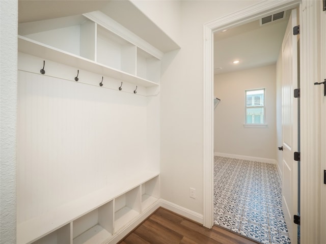 2320 Lucky Ln, Leander, TX 78641 - mudroom with recessed lighting and dark wood-style floors