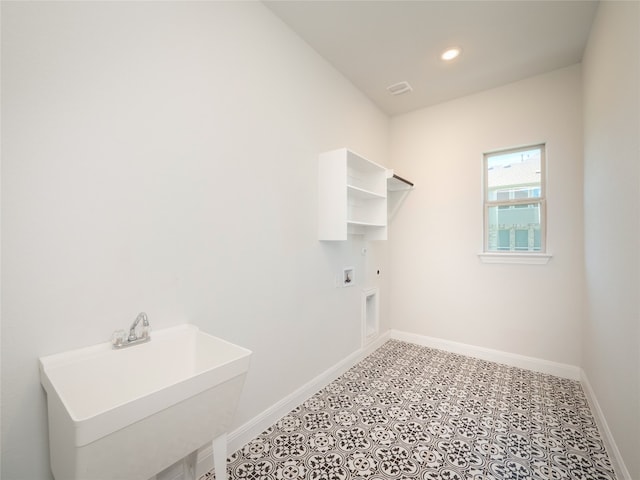2320 Lucky Ln, Leander, TX 78641 - laundry room featuring hookup for a washing machine, light flooring, recessed lighting, and electric dryer hookup