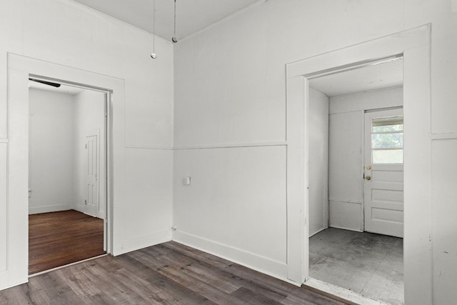 102 S Western Ave, Lampasas, TX 76550 - empty room with dark wood-style flooring and baseboards