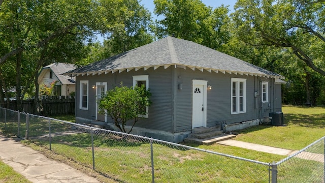 102 S Western Ave, Lampasas, TX 76550 - bungalow with entry steps, a shingled roof, and a fenced front yard