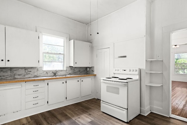 102 S Western Ave, Lampasas, TX 76550 - kitchen with white electric range, dark wood finished floors, white cabinets, and tasteful backsplash