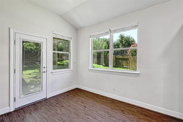 2232 Skippy Cv, Leander, TX 78641 - spare room with wood finished floors and vaulted ceiling