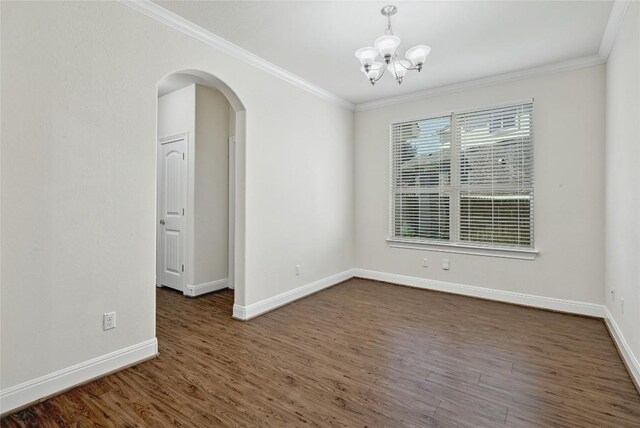 2232 Skippy Cv, Leander, TX 78641 - empty room featuring arched walkways, crown molding, a chandelier, and dark wood-type flooring