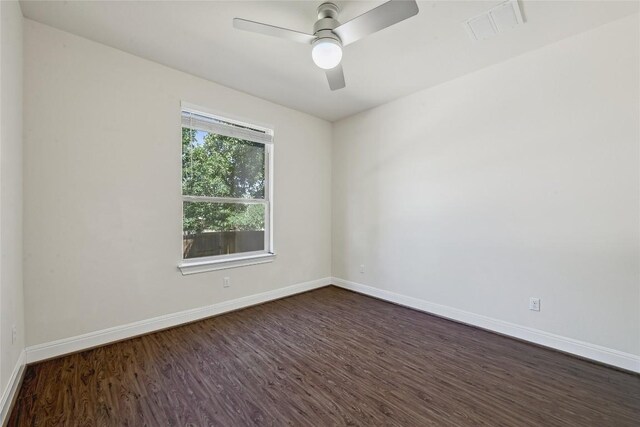 2232 Skippy Cv, Leander, TX 78641 - spare room with dark wood-style flooring and ceiling fan